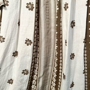 A Dainty Jewels dress with tags.